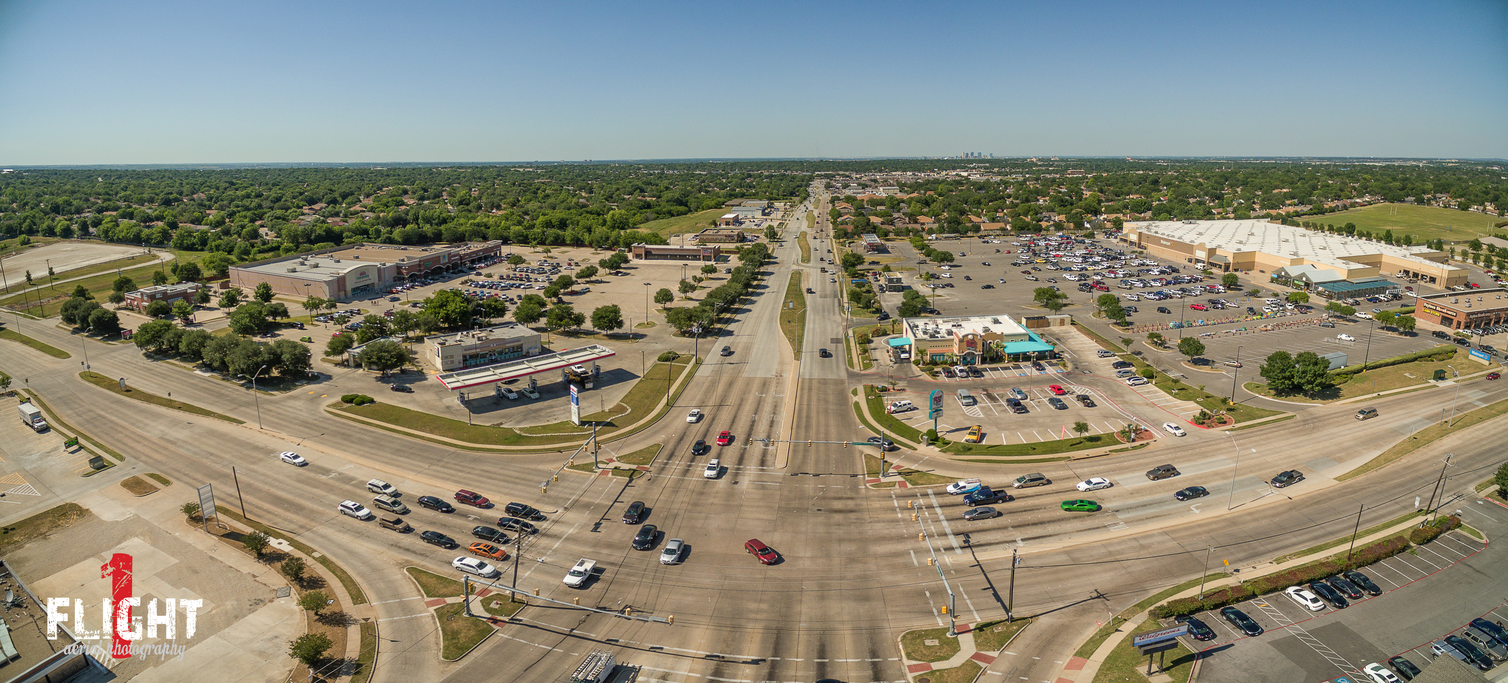 Aerial drone real estate photography of a DFW residential property listing exterior.