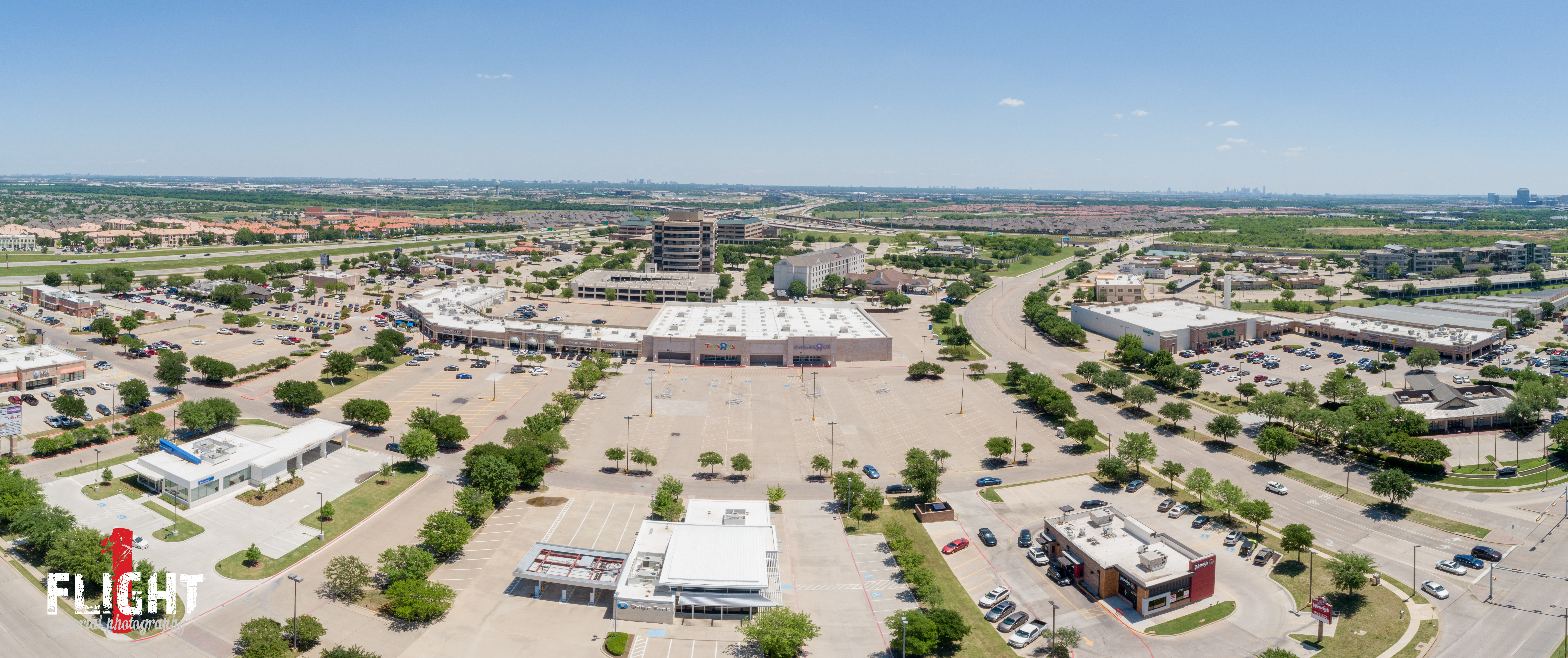 DFW real estate drone photography capturing the exterior of a spacious property listing.