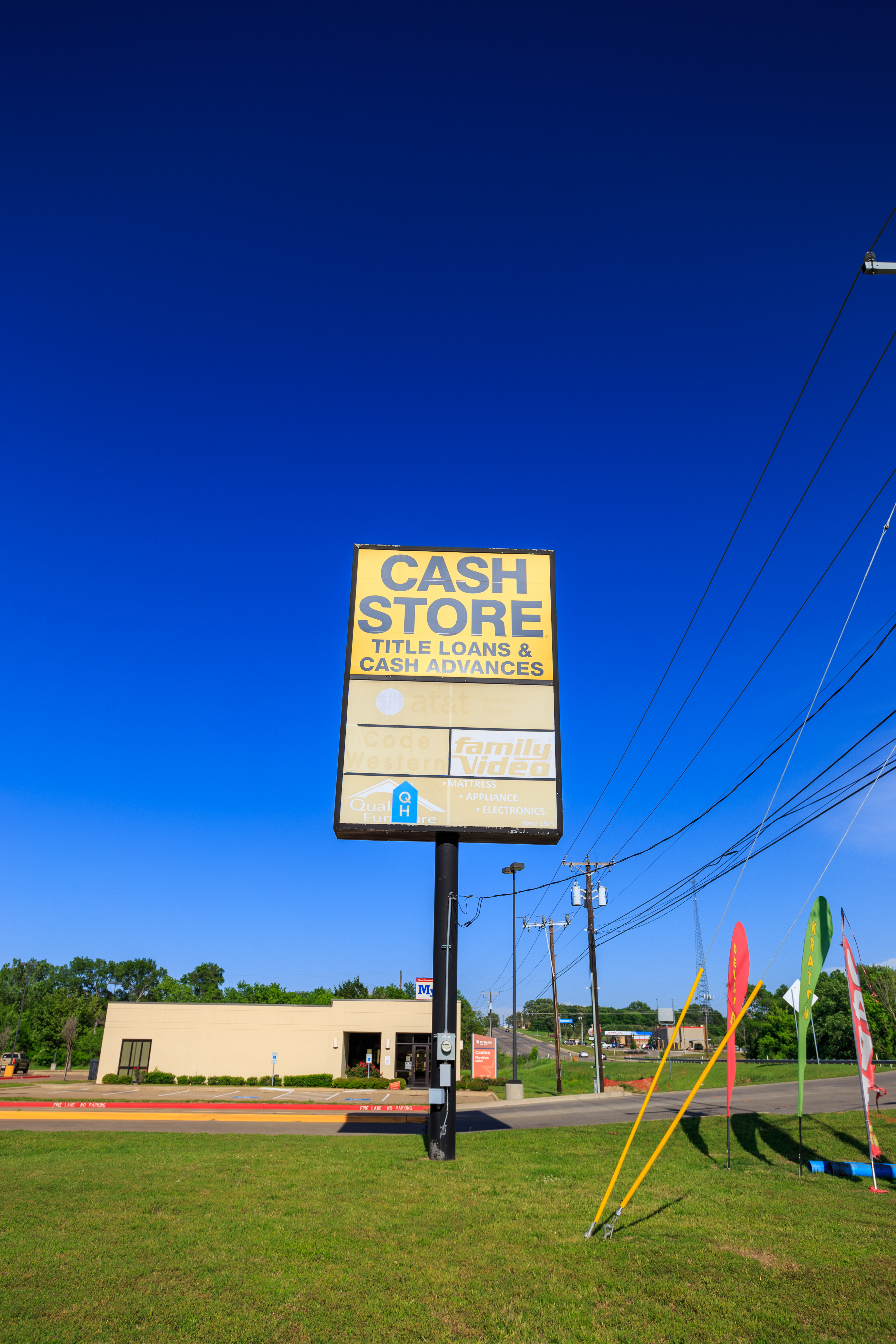 Real estate photography showcasing Bridwell Shopping Center's exterior for DFW listings.
