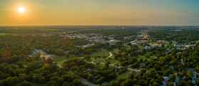 Cityscape aerial drone photography of Gainesville, Texas urban development.